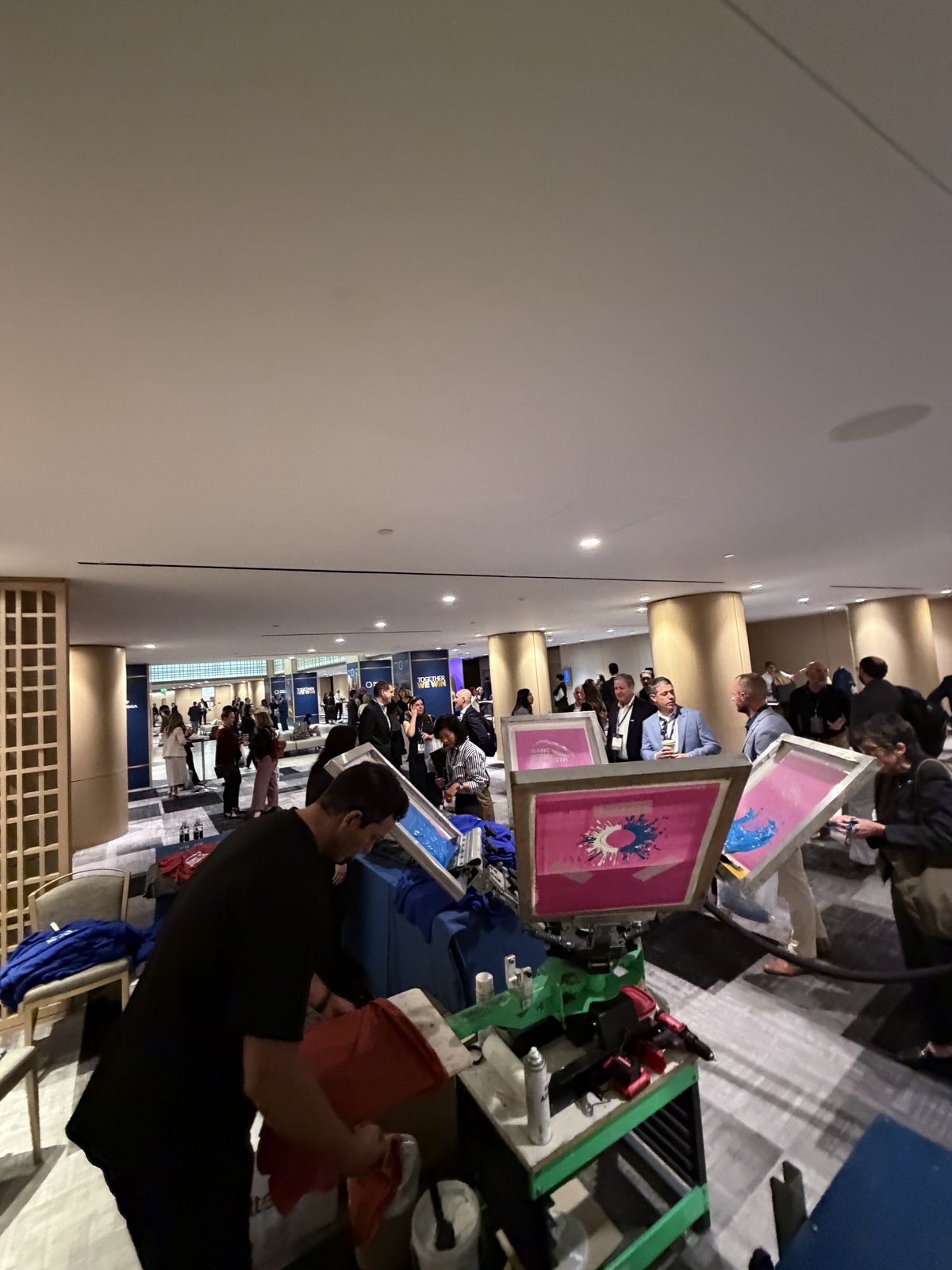 Merch Troop live printing — presses rolling at the event
